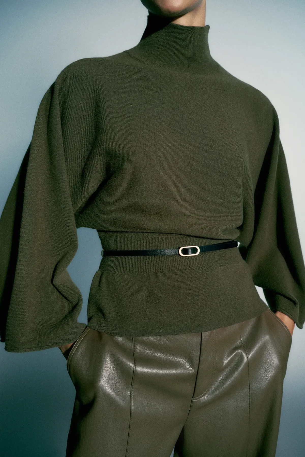 KNITTED BELTED SWEATER